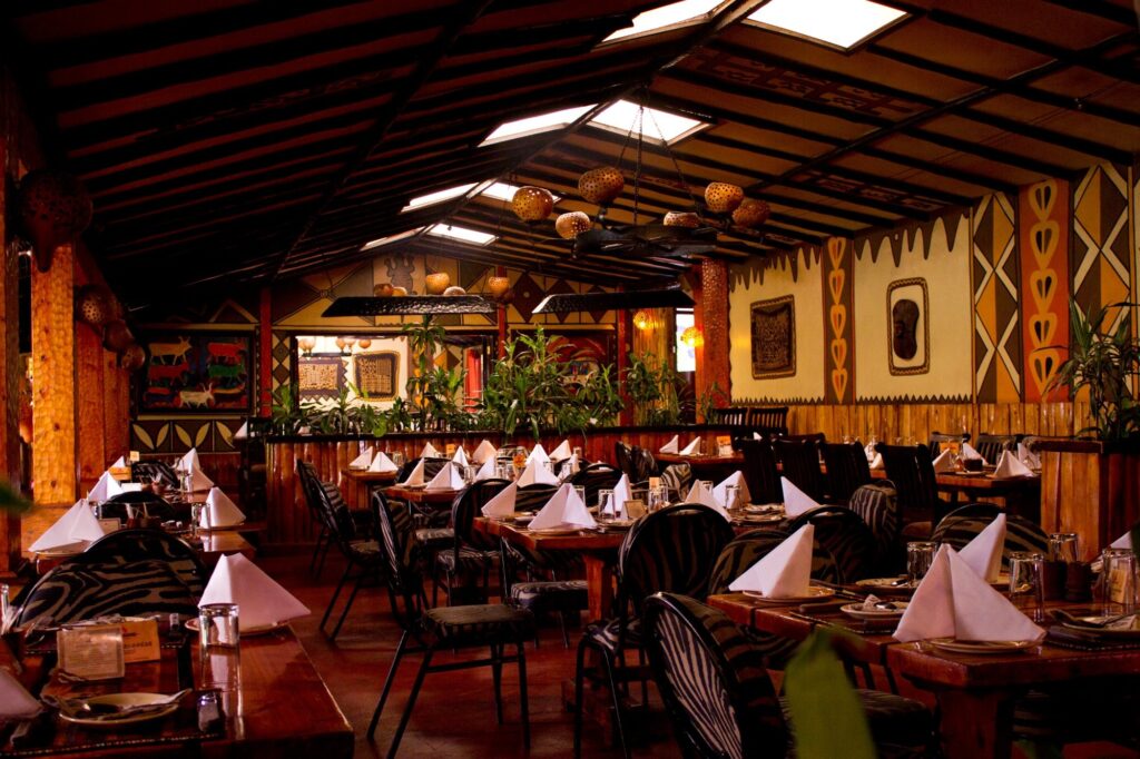 Roast meats carved over the charcoal pit at Carnivore Restaurant, Nairobi